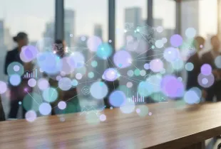 Blurred conference room with professionals and holographic data network overlays depicting global security analytics.